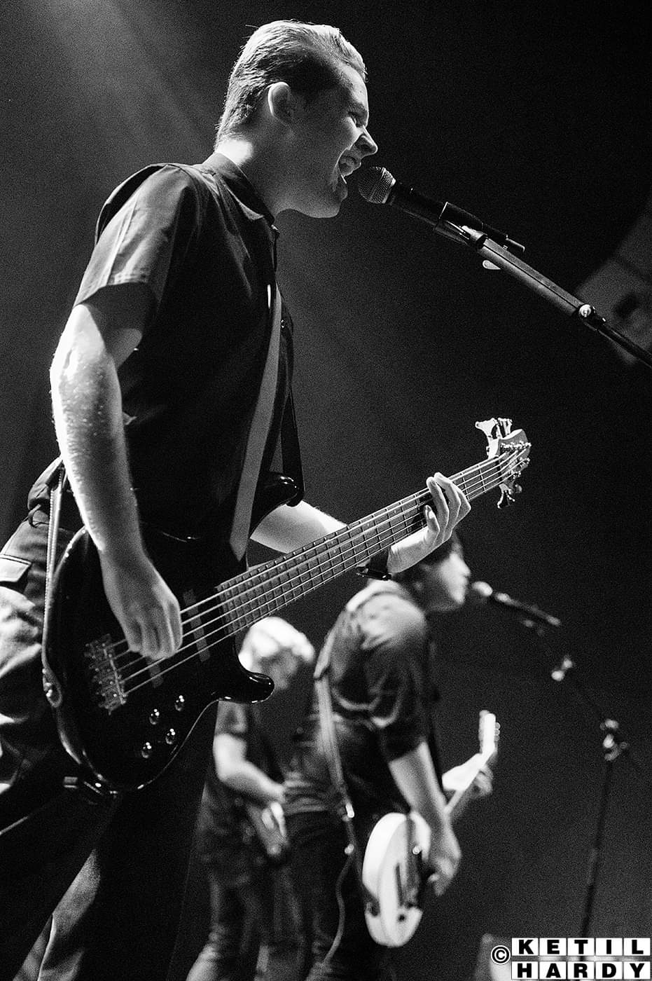 Image of me on stage with one of my bass guitars, by Ketil Hardy.